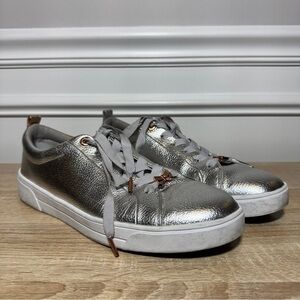 Ted Baker Gielli Silver Sneakers Sleek‎ Modern Design Rose gold metal details.